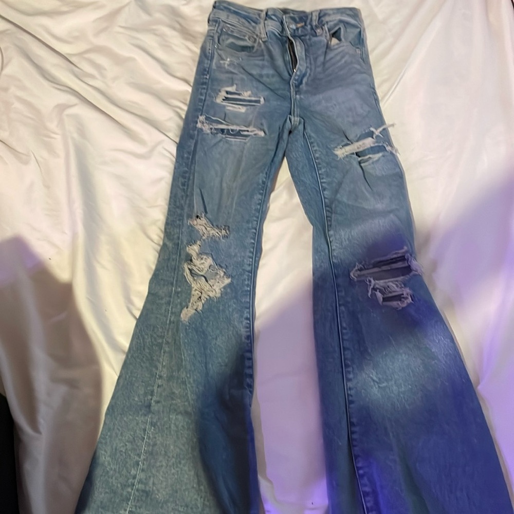 American Eagle flair jeans  they’re a size 0 but they stretch high rise